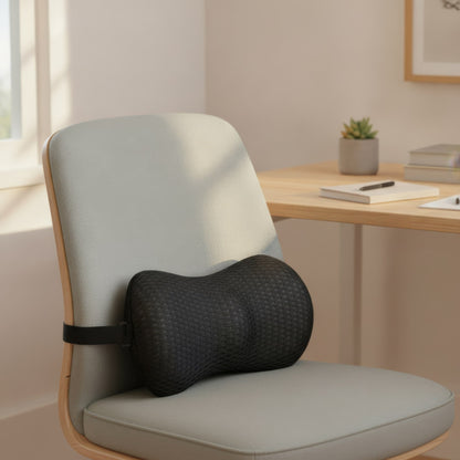 SpineEase lumbar support strapped to an office chair backrest
